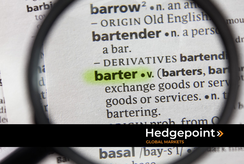 Imagem de uma lupa mostrando a definição da palavra barter no dicionário.